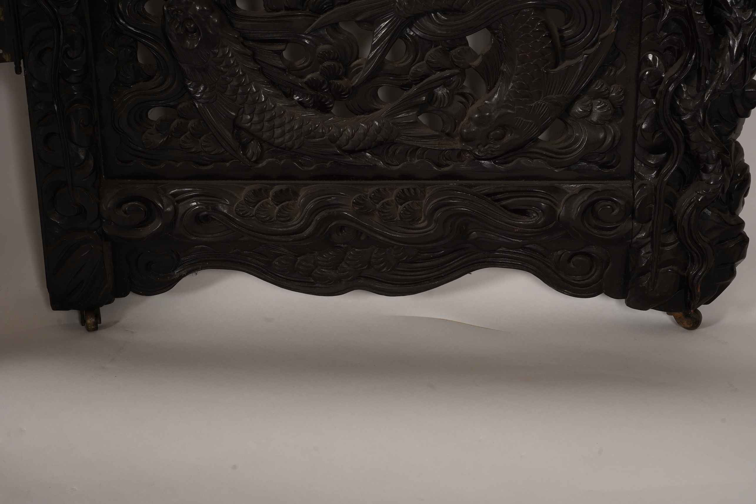 A pair of large Japanese carved hardwood ’dragon’ screen frames, Meiji period